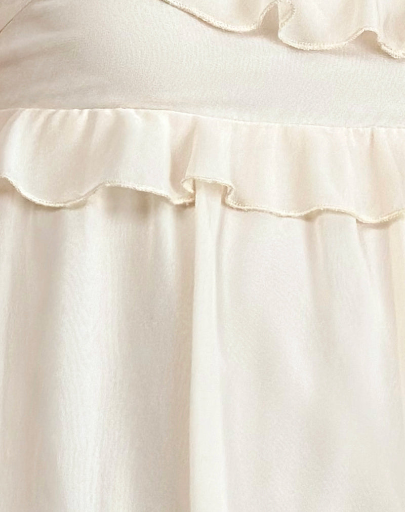 Garistha Babydoll Puffball Mini Dress in Cream